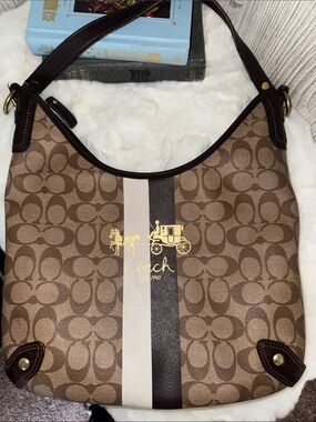 Coach Brown Signature Canvas Shoulder Bag with Gold Accent and Center Stripes